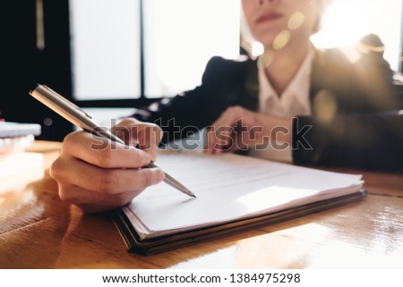 Close up business man signing contract making a deal with business partner - Business deal concept