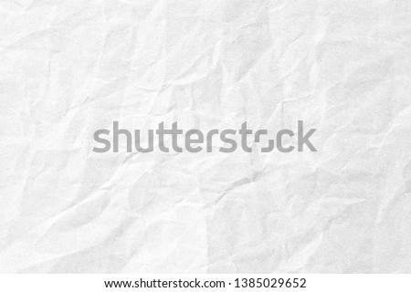 Crumpled white background paper texture
 Royalty-Free Stock Photo #1385029652
