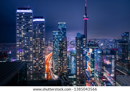 Entire futuristic city skyline view of downtown Toronto Canada. Modern buildings, urban architecture, cars travelling. construction and development in a busy city.