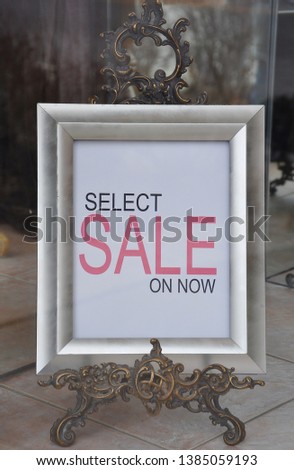 Select sale on now sign