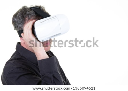 man in black shirt wearing VR virtual reality goggles