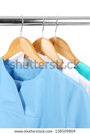 Medical clothing on hunger isolated on white