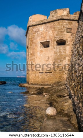 The impressive medieval sea-front ramparts of the city of Alghero (L’Alguer), province of Sassari , northwestern Sardinia, Italy. 