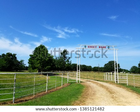 Welcoming entrance to a Midwest farm