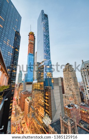 Amazing night skyline of Manhattan. Wide angle portrait view of New York City aerial skyline from Midtown Rooftop.