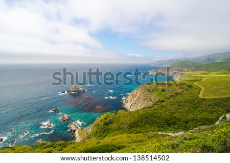 A beautiful view of California's coastline along California State Route 1, one of the most famous and spectacular drives in the United States. Royalty-Free Stock Photo #138514502