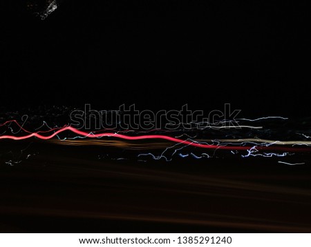 Colorful lights of trail urban surrounding blurred by motion
