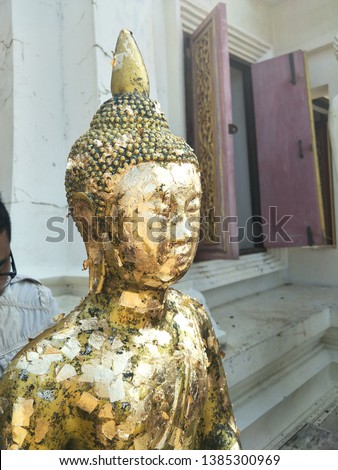 Selective focus point on Buddha statue.Moblie picture