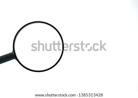 Isolated magnifying glass on white background, copy space.