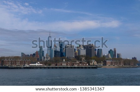 View of Governors Island National Monument with the New York City skyline in the background