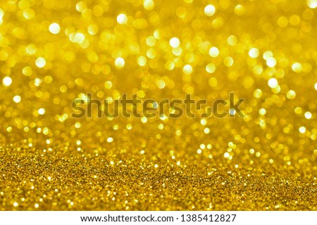 sparkle of golden glitter texture background