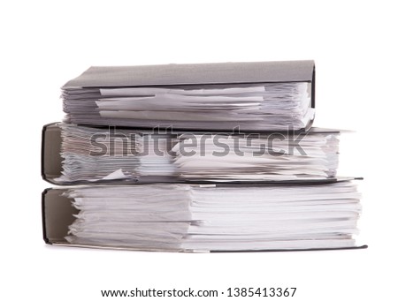 Folder with documents isolate on white background. A stack of office documents close-up.