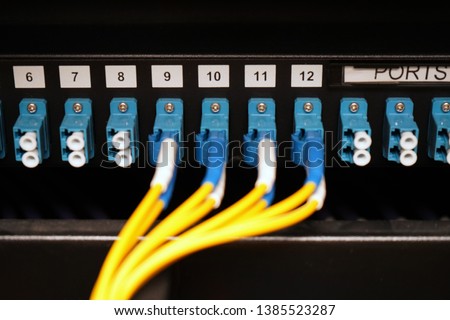 Fibre cables going in to a patch panel 
