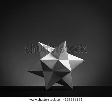 figure of a polyhedron on a black background.