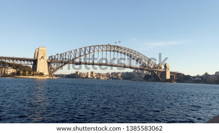 Harbor bridge in the morning with clear blue sky