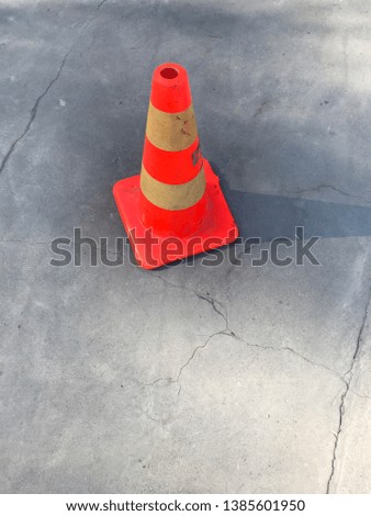 Traffic cone standing on street