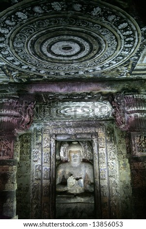 sacred statue of Buddha in cave temple, India, Ajanta