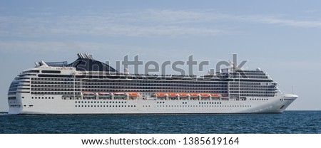 CRUISE SHIP - A beautiful passenger ship in a cruise on the sea