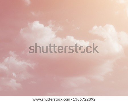Pastel pink clouds in the sky duoton background