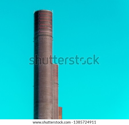 Abstract looking chimneys of the power plant of a large factory, building