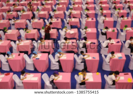 Blurred picture of kids writing test competition 