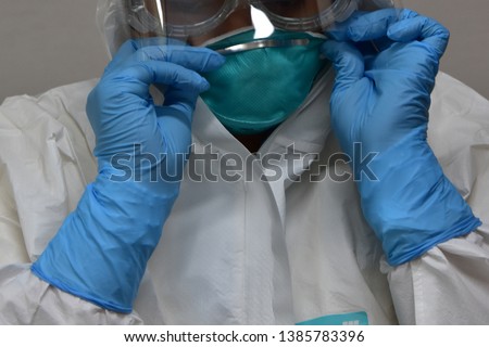 Protective sterile suit in hospital,Thailand Royalty-Free Stock Photo #1385783396