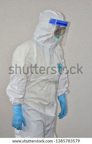 Protective sterile suit in hospital,Thailand Royalty-Free Stock Photo #1385783579