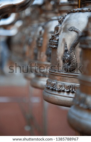 Bronze bells perspective view in a temple in Bangkok