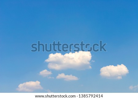 Blue sky with clouds texture and background