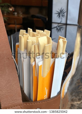 Close up on a bunch of chopsticks at a resturant