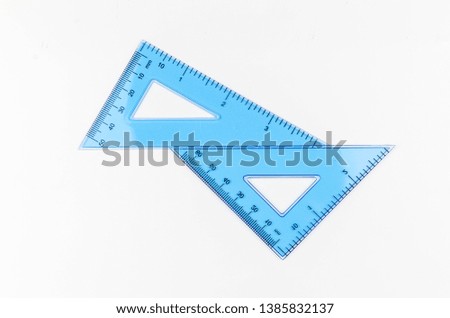 Ruler metric at white background, top view. Selective focus.