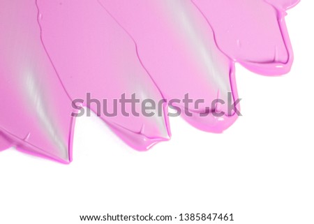 Pink lipstick smear isolated on white. Beauty fashion texture