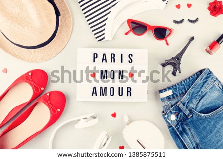 Fashion flat lay with french style girls urban outfit. Trendy summer shopping concept with text Paris my love translation from French