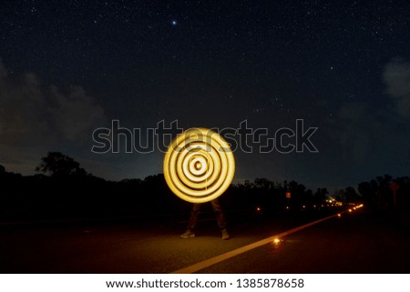 Motion of the light circle in the night on the road.