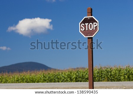 Stop sign against a blue sky, Stowe Vermont, USA
