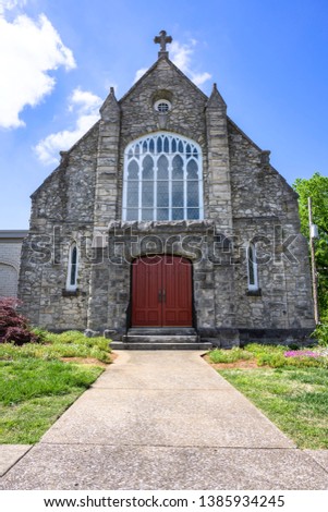 Historic stone church landscape from architecture outdoor image as vertical background