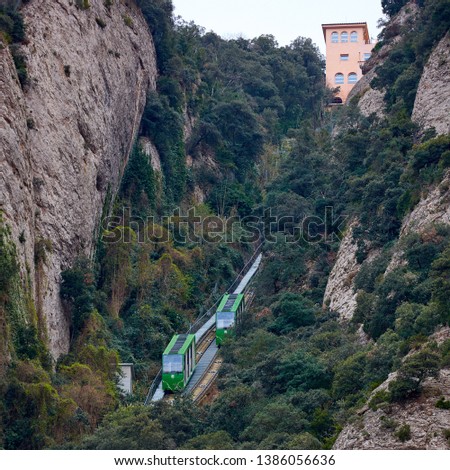 Montserrat mountain funicular to Santa Cova. The Benedictine abbey Santa Maria de Montserrat in Monistrol de Montserrat, Spain.