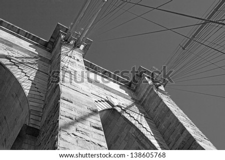 Monochromatic view of Brooklyn Bridge pillar (New York City, USA)