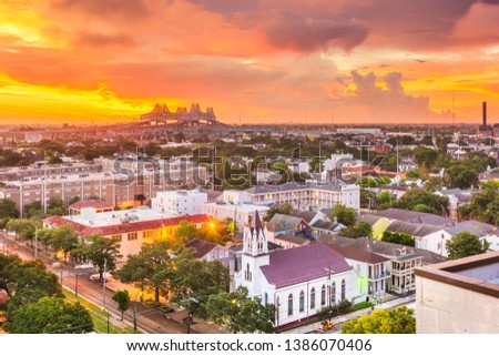 New Orleans, Louisiana, USA town skyline over the Garden District at dawn.