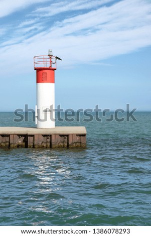 Navigation beacon at the mouth of a harbour