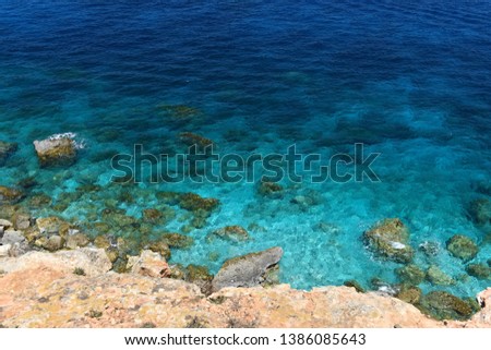 Emerald turquose sea , maltese coastline. clean sea background.