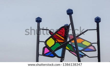 Picture of a colorful plastic tile mosaic in a kids playground