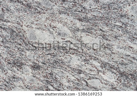 gray garnite stone wall background texture closeup