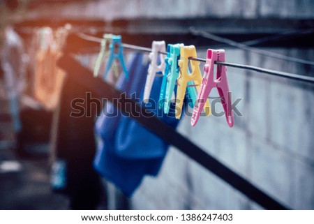 Colorful clothespin clothespins on the hangers,Vintage style