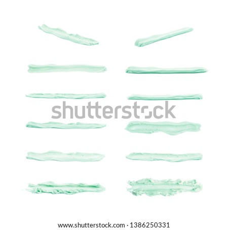Line of frosting cream isolated over the white background, set of multiple different foreshortenings