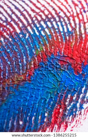 colorful painted fingerprint as background close up and macro view
