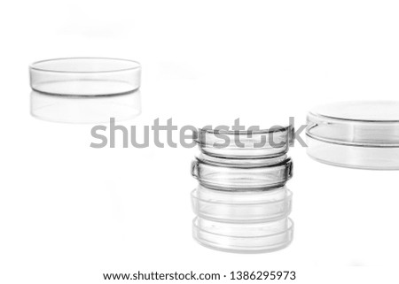 stacked glass a laboratory dish(chalet) isolated white.