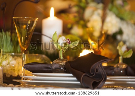 Table setting at a high end wedding. Royalty-Free Stock Photo #138629651