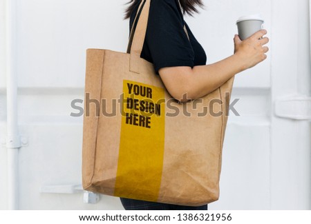 Design space on a blank brown tote bag Royalty-Free Stock Photo #1386321956