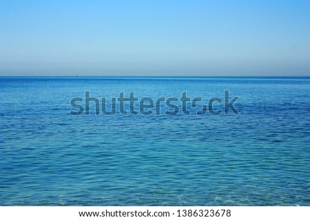 Blue surface of the calm sea